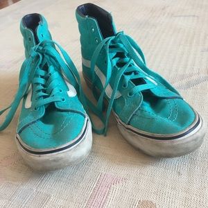 Turquoise Vans high tops